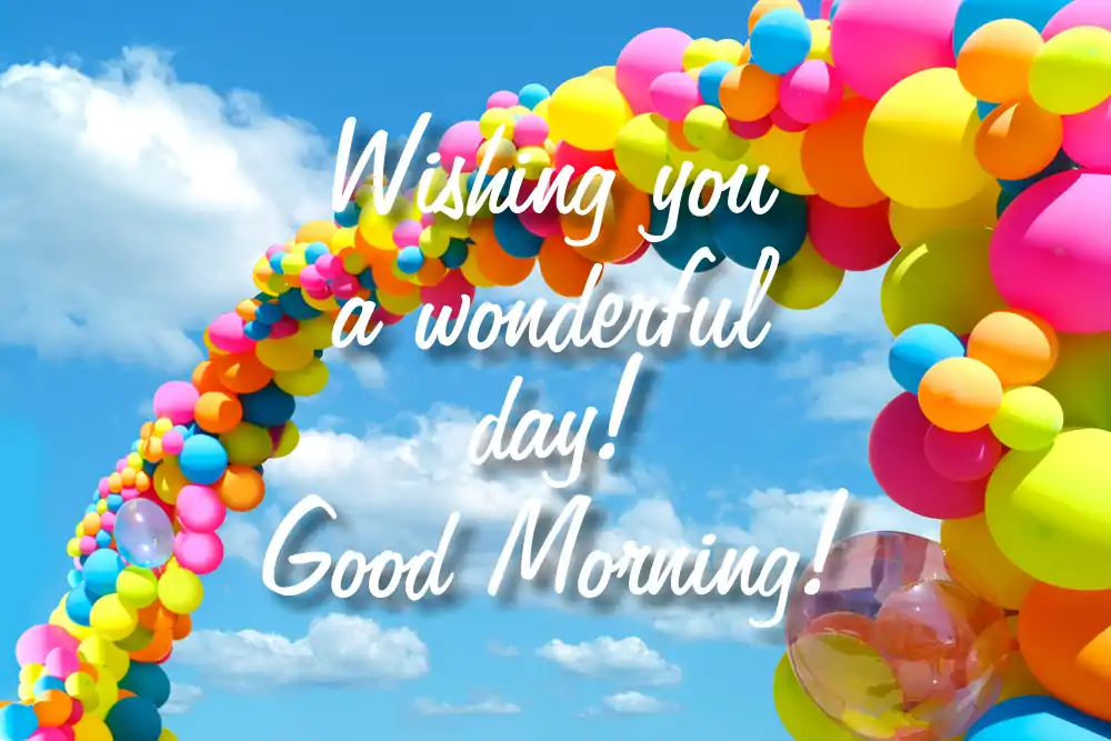 Multicolored balloons against a beautiful sky with warm good morning wishes.