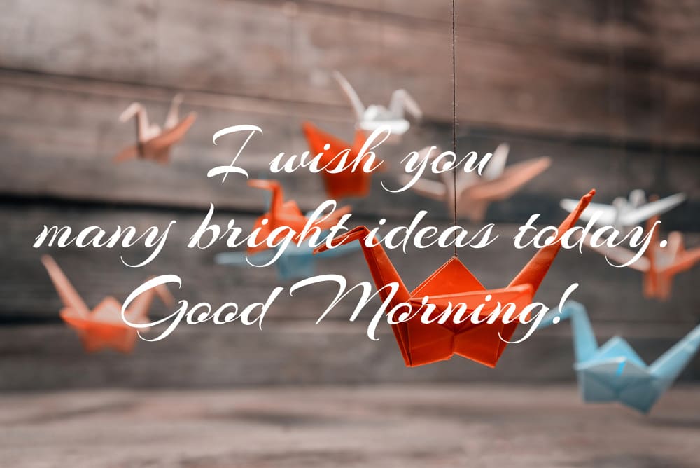 Optimistic morning wish with colorful origami background.